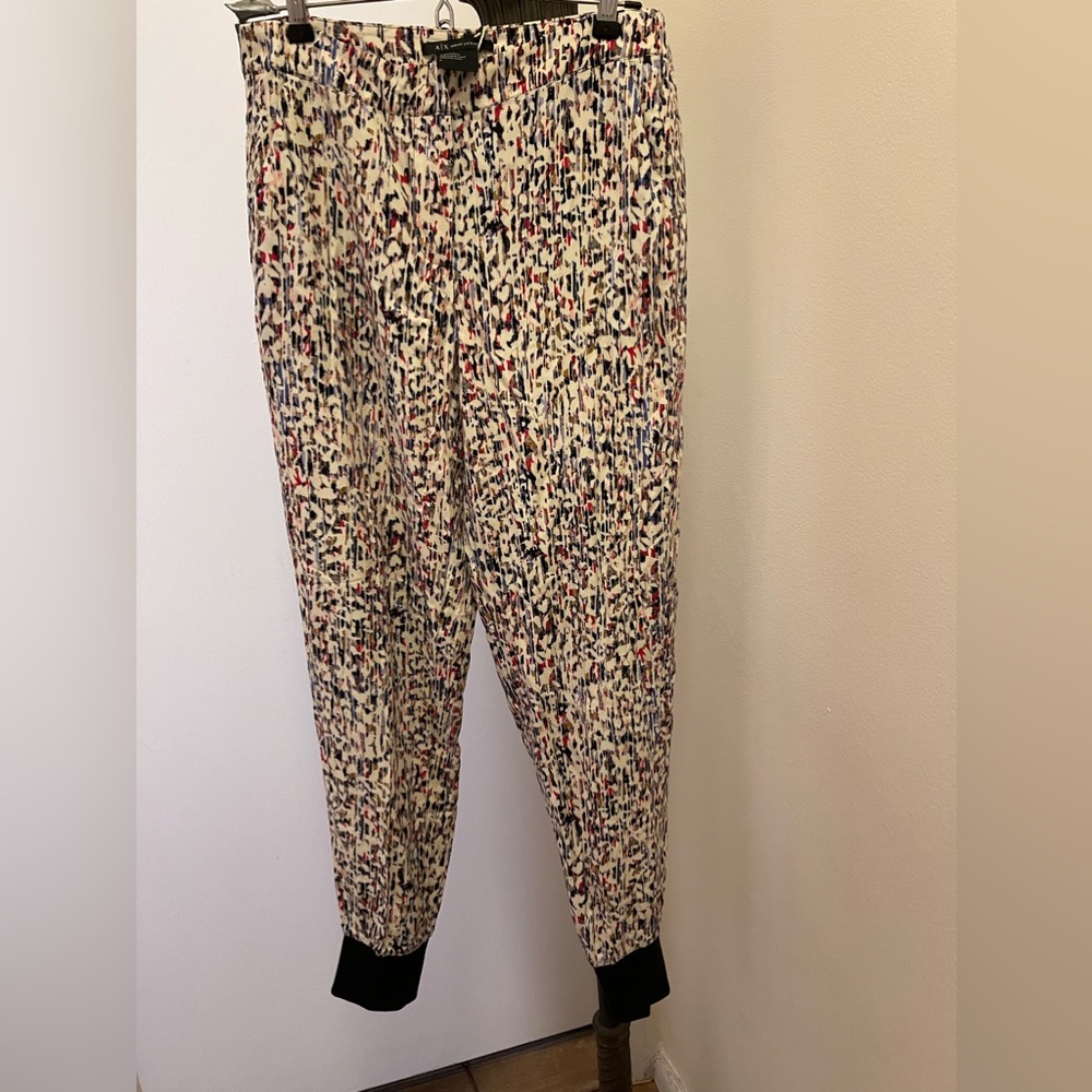 Armani Exchange leggings with a zipper front.